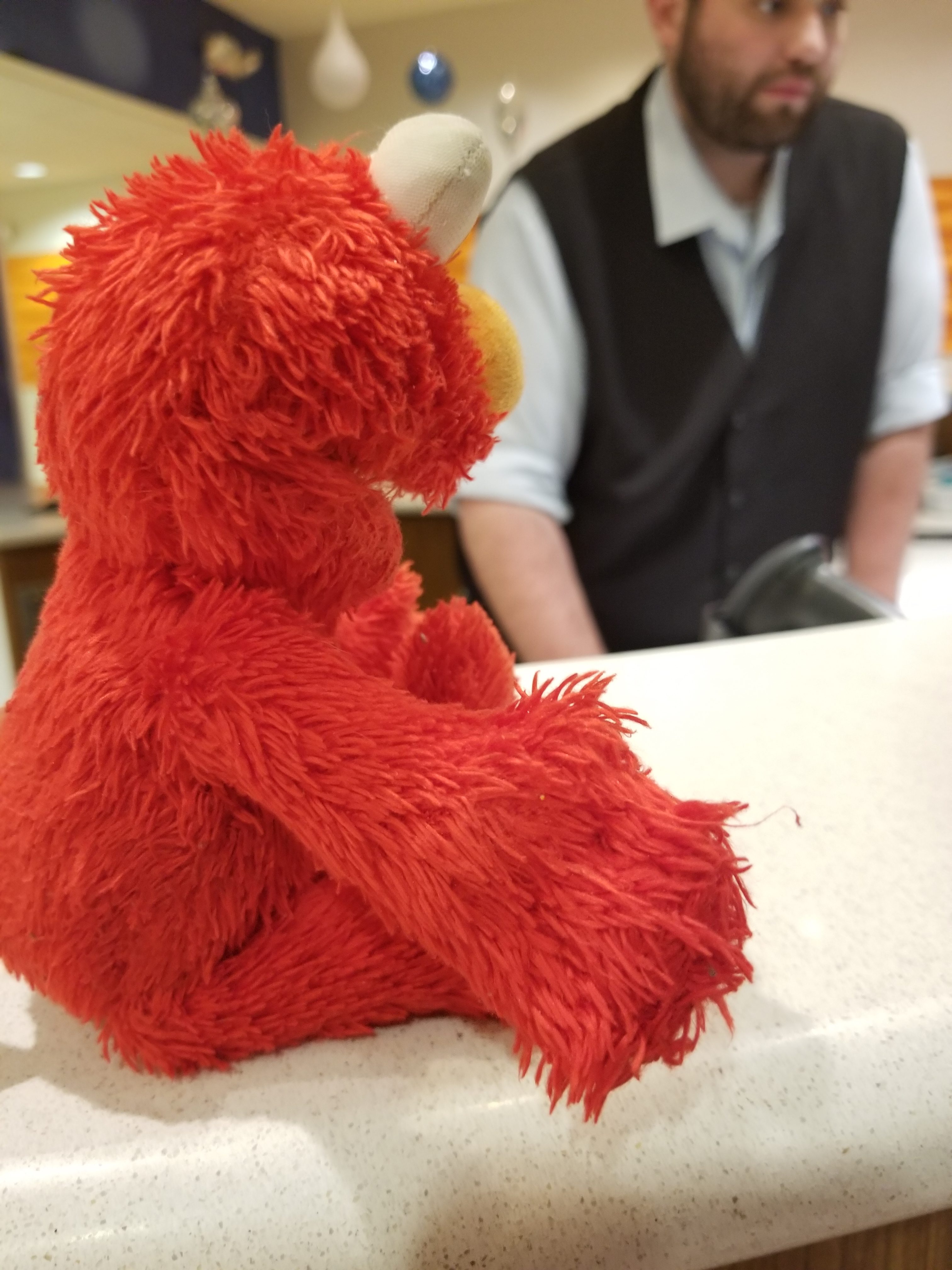 Elmo Checks In to his Hotel Room