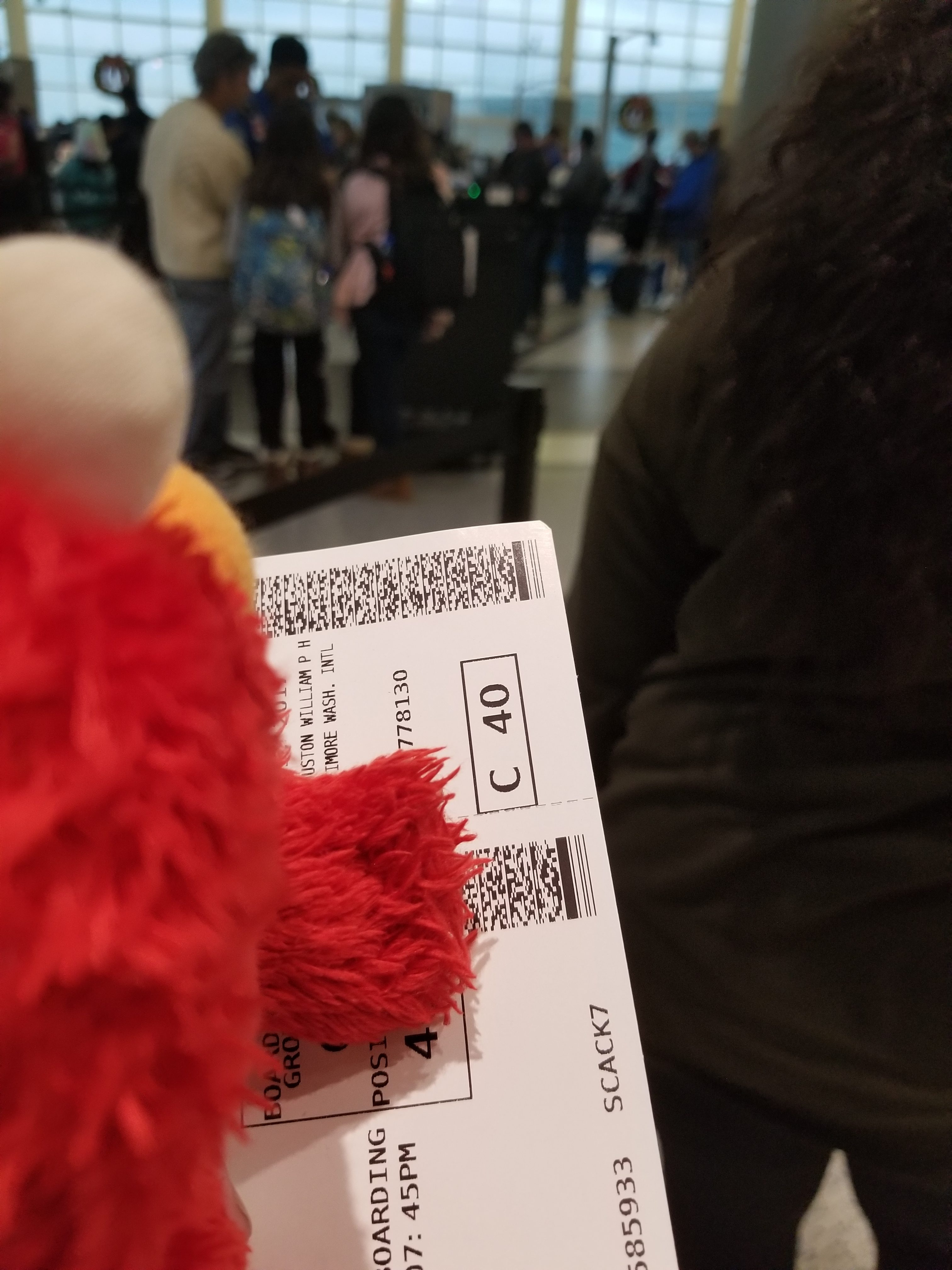 Elmo gets his boarding pass