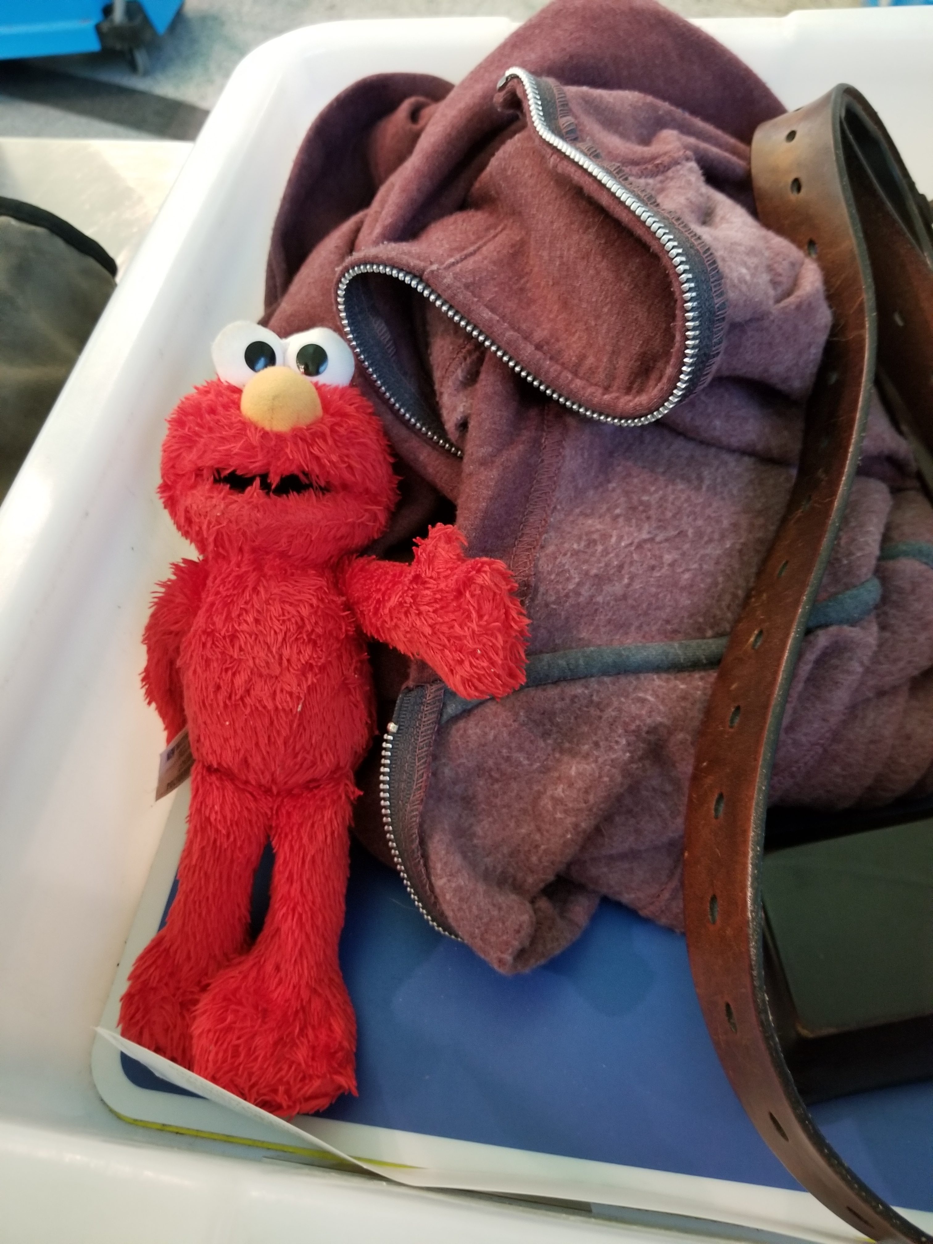 Elmo goes through the TSA check