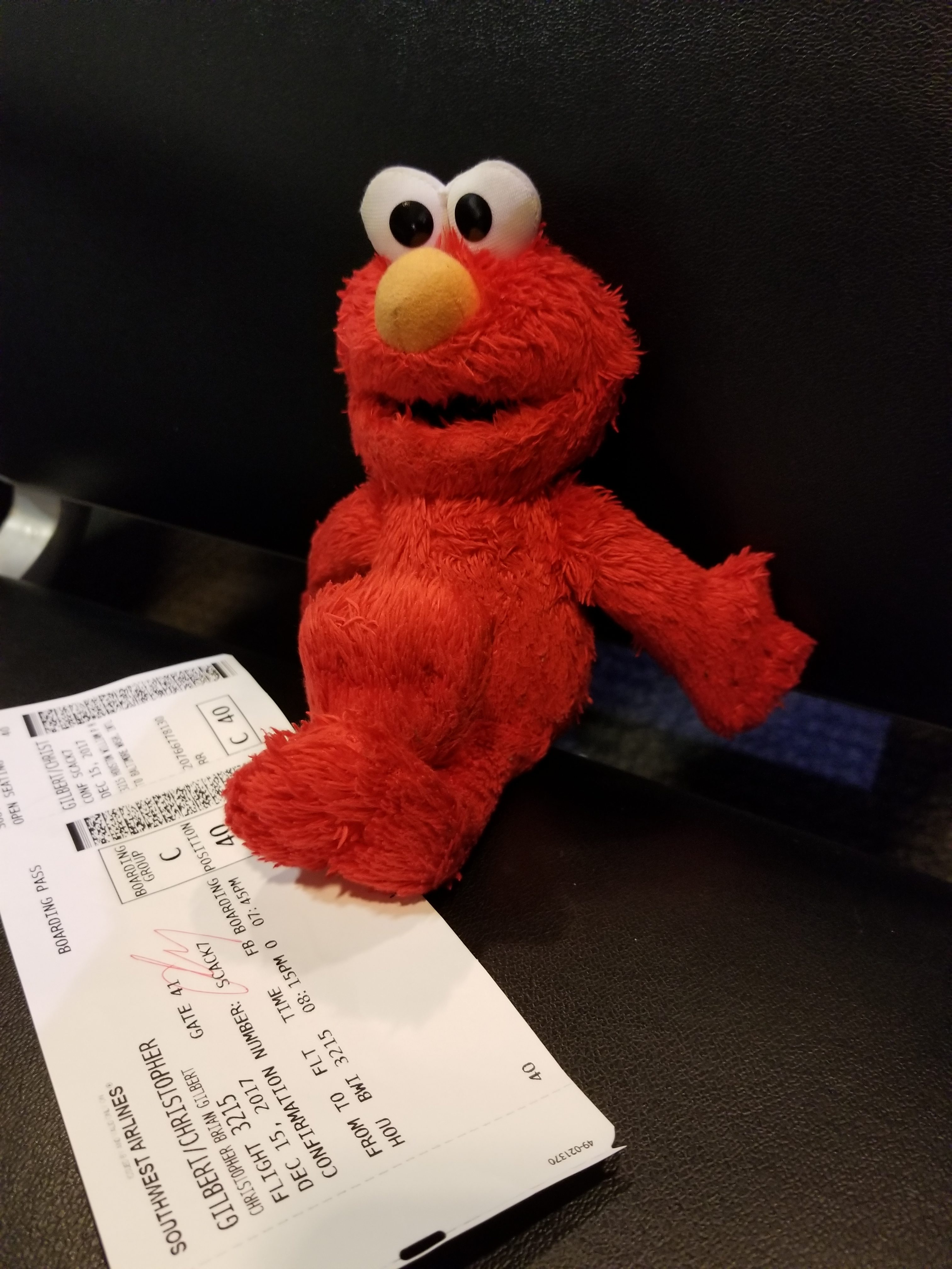 Elmo waits for his boarding call